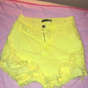 Bright yellow high waist shorts